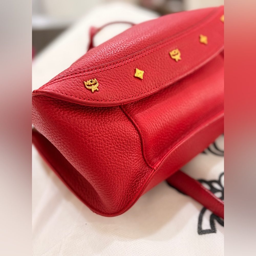 MCM Red Leather Bucket Bag
Crossbody Drawstring Gold Hardware - Picture 10 of 17
